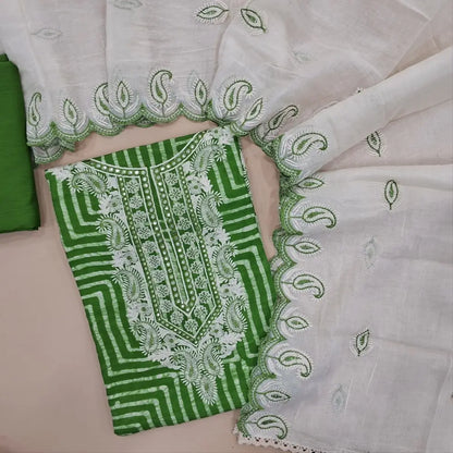 Leafy green modal wax batik dyed unstitched salwar material, foil work on yoke (Lining Needed) Matching silky bottom, embroidered soft cotton dupatta. JA261709