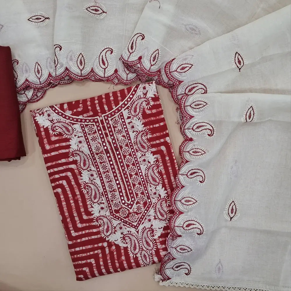 Red modal wax batik dyed unstitched salwar material, foil work on yoke (Lining Needed) Matching silky bottom, embroidered soft cotton dupatta. JA261706