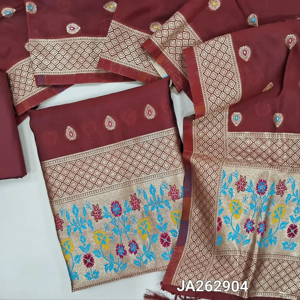 Dark Maroon benarasi silk cotton unstitched salwar material (lining needed)colorful buttas allover, heavy paithani woven daman, matching silk cotton bottom, colorful buttas silk coton full length dupatta with paithani woven pallu & tassels. Ja262904