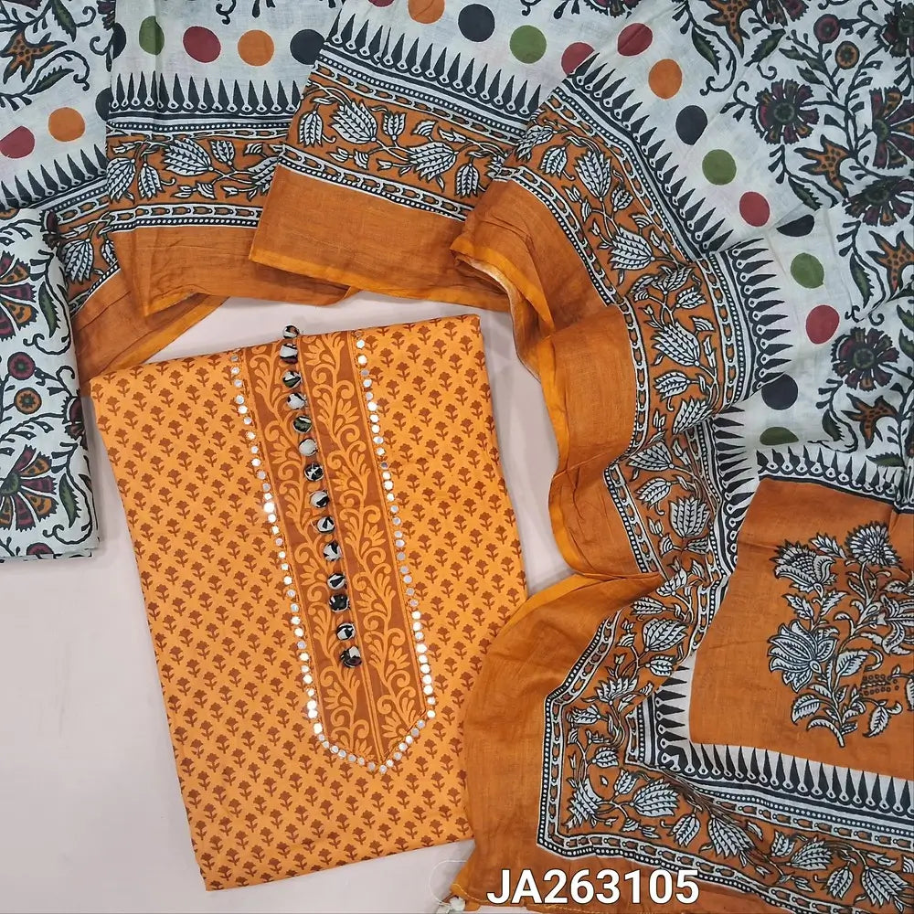 Printed Yellow soft cotton unstitched salwar material(lining needed) faux mirror, potli buttons on yoke, printed cotton bottom, printed mul cotton dupatta with pompom tapings. JA263105