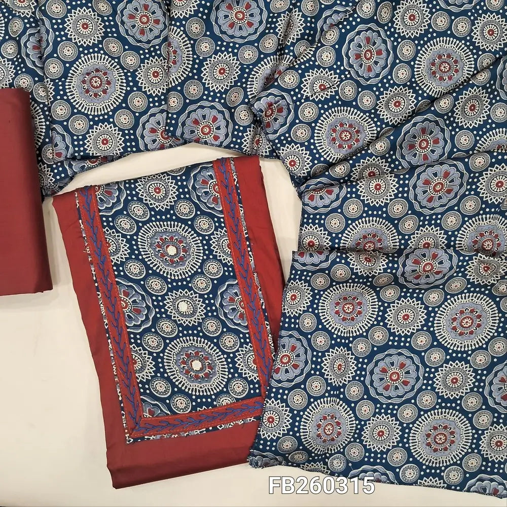 Brick red with dark blue satin cotton unstitched salwar material, ajrak yoke with real mirror and embroidery detailing on front (Lining Optional) matching cotton bottom, ajrak printed silk cotton dupatta. FB250315