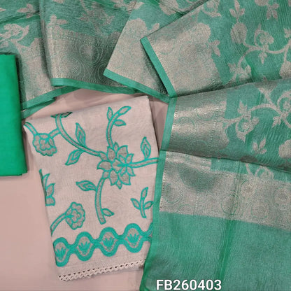 Rich half white with gold tint tissue linen unstitched salwar material,embroidery and rich applique work on front (Lining needed) turquoise green santoon bottom, crinkled silk cotton dupatta with benarasi zari weaving. FB260403
