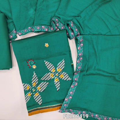 Dark turquoise green satin cotton digital printed unstitched salwar material, prints highlighted with embroidery and sequins work (Lining Optional) spun cotton bottom, plain chiffon dupatta with printed tapings. FB260419
