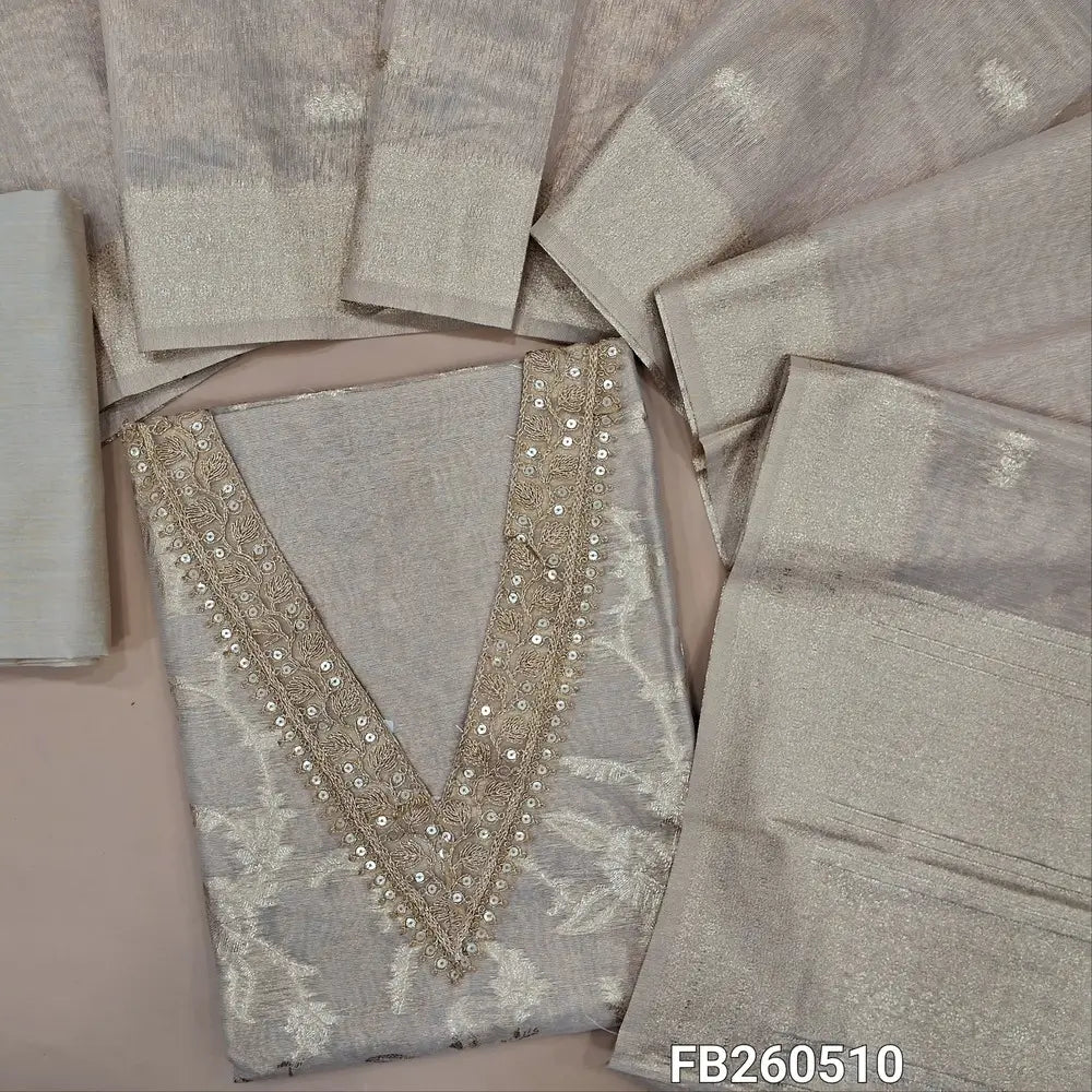 Ivory with golden tint tissue silk cotton unstitched salwar material(lining needed)v neck with zari,sequins work on yoke,zari weaving on front,silk cotton bottom, floral buttas on tissue silk cotton dupatta with rich benarasi weaving pallu .FB260510