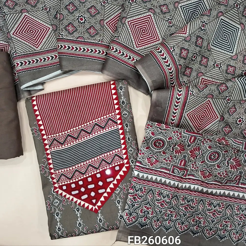 Dark brownish grey printed satin cotton unstitched salwar material, (Lining Optional) printed and real mirror yoke,matching spun cotton bottom, printed full length pure cotton dupatta. FB260606