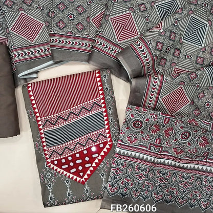 Dark brownish grey printed satin cotton unstitched salwar material, (Lining Optional) printed and real mirror yoke,matching spun cotton bottom, printed full length pure cotton dupatta. FB260606