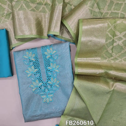 Pastel blue with golden tint tissue silk cotton unstitched salwar material(lining needed)cut work,embroidery and sequins work on yoke, matching silk cotton bottom,dual shaded Benarasi zari weaving tissue silk cotton dupatta with tassles. FB260610
