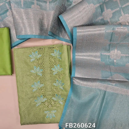 Pastel green with golden tint tissue silk cotton unstitched salwar material(lining needed)cut work,embroidery and sequins work on yoke, matching silk cotton bottom,dual shaded Benarasi zari weaving tissue silk cotton dupatta with tassles. FB260624