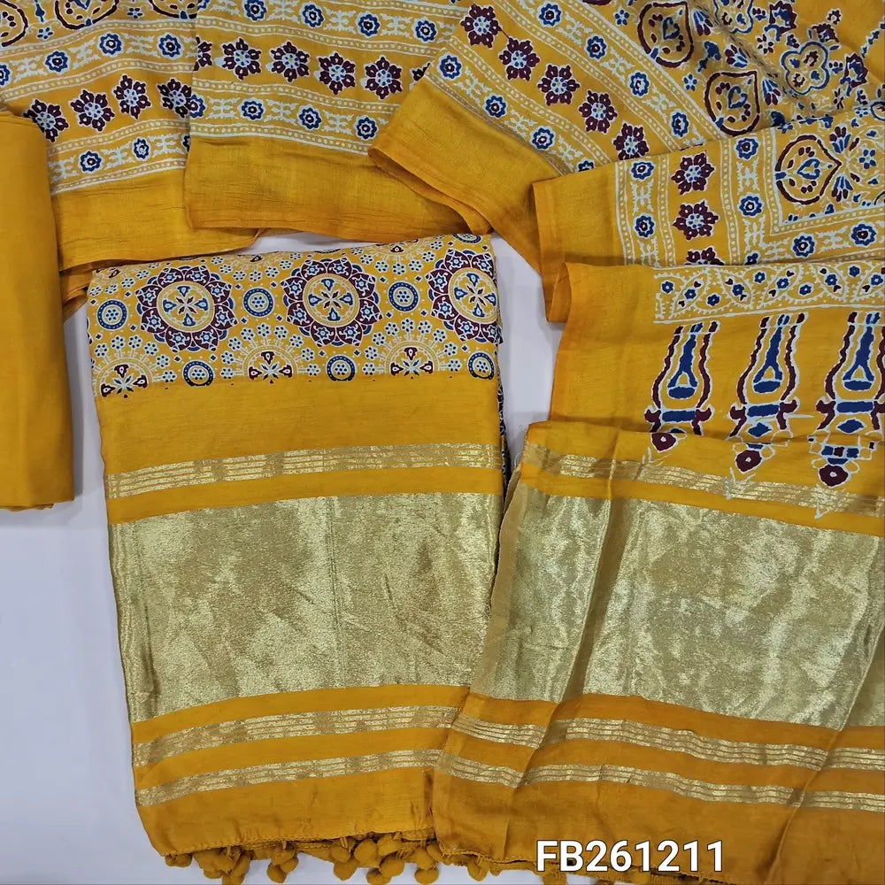 Mehandhi yellow taspa silk unstitched salwar material( lining needed) ajrak printed all over, golden tissue borders with daman,matching spun cotton bottom,printed full length taspa silk dupatta with golden tissue pallu.FB261211
