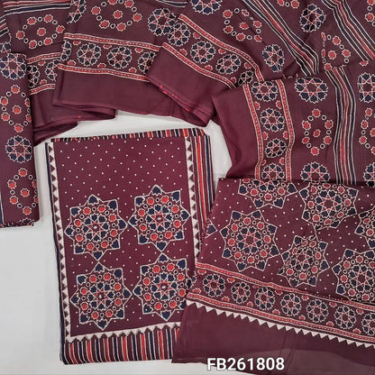 Dark maroon pure cotton unstitched salwar material(lining optional)ajrak printed yoke with zari work, vertical printed all over, printed cotton bottom, printed full length mul cotton dupatta. FB261808