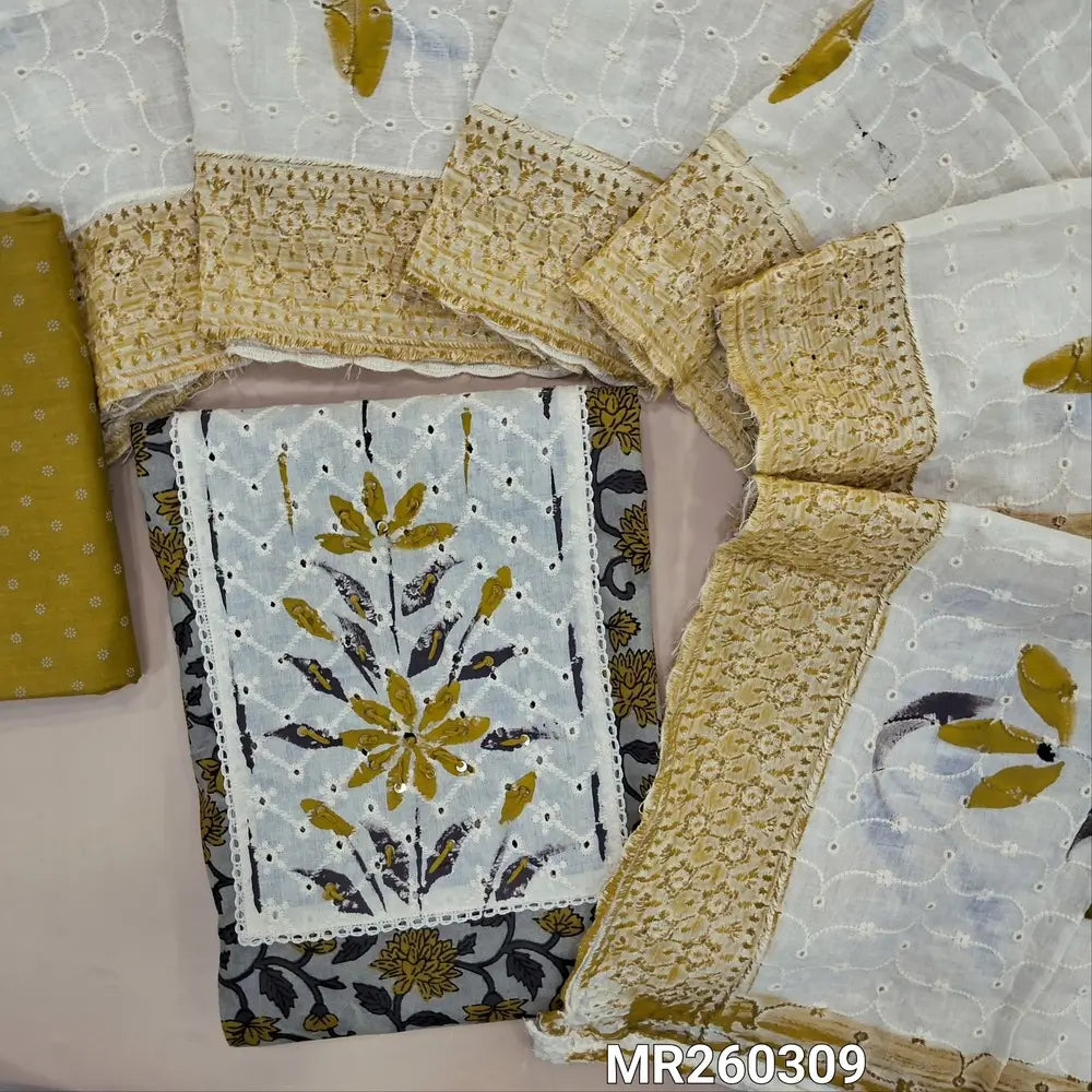 Light grey base printed pure cotton unstitched salwar material, schiffli yoke patch with thread& sequins work(lining optional)printed mehandhi yellow cotton bottom, schiffli embroidered and brush painted on pure cotton dupatta. MR260309