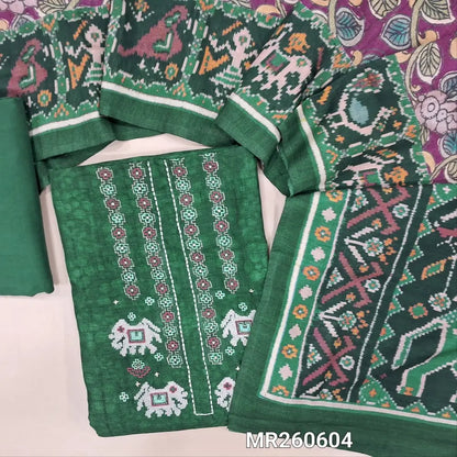 Dark green premium tussar silk unstitched salwar material, patola embroidery with thread and zari wok on yoke, printed yoke (lining needed) matching santoon bottom, kalamkari printed on tussar silk dupatta with patola printed pallu and borders. MR260604