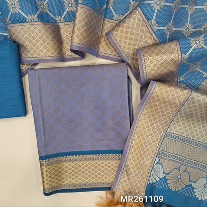 Greyish blue fancy jakard silk cotton unstitched salwar material ( soft,lining optional) self weaving all over, thread woven borders,teal blue silk cotton bottom, brocade weaving on silk cotton dupatta width thread woven pallu . MR261109