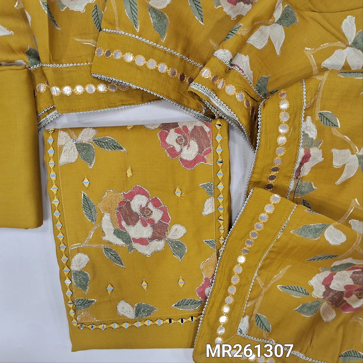 Mehandhi yellow silk cotton unstitched salwar material, floral design yoke with zari and real mirror work (lining needed)spun cotton bottom,floral printed soft silk cotton dupatta with foil work borders. MR261307