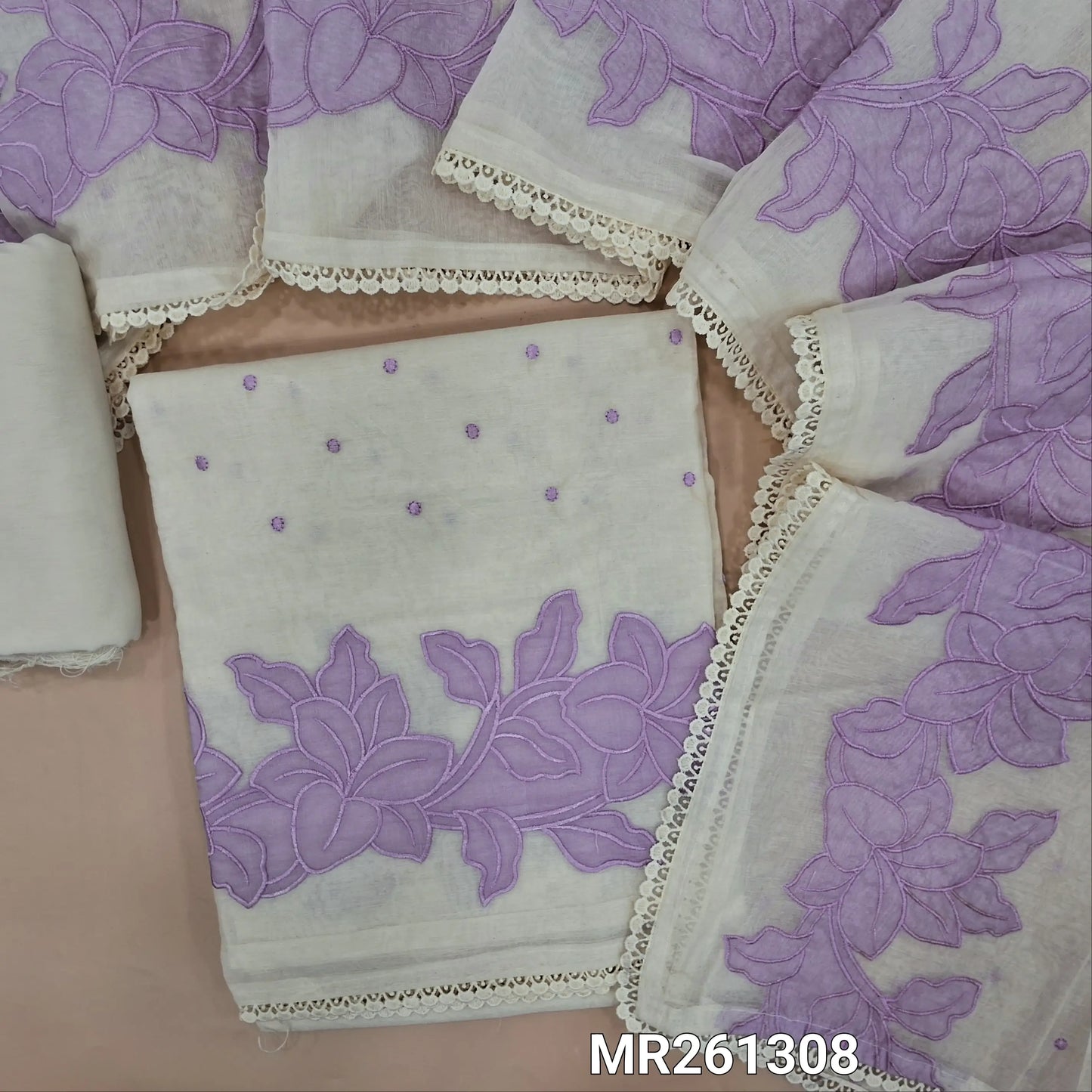 Half white base chanderi silk cotton unstitched salwar material, thread embroidery on front,purple applique work on daman,(lining needed)silk cotton dupatta,embroidery and applique work on chanderi silk cotton dupatta with lace tapping. MR261308