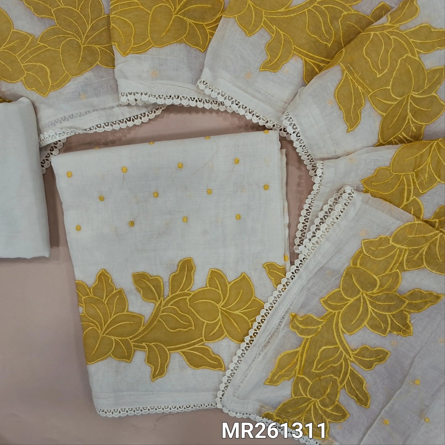 Half white base chanderi silk cotton unstitched salwar material, thread embroidery on front,pastel yellow applique work on daman,(lining needed)silk cotton dupatta,embroidery and applique work on chanderi silk cotton dupatta with lace tapping. MR261311