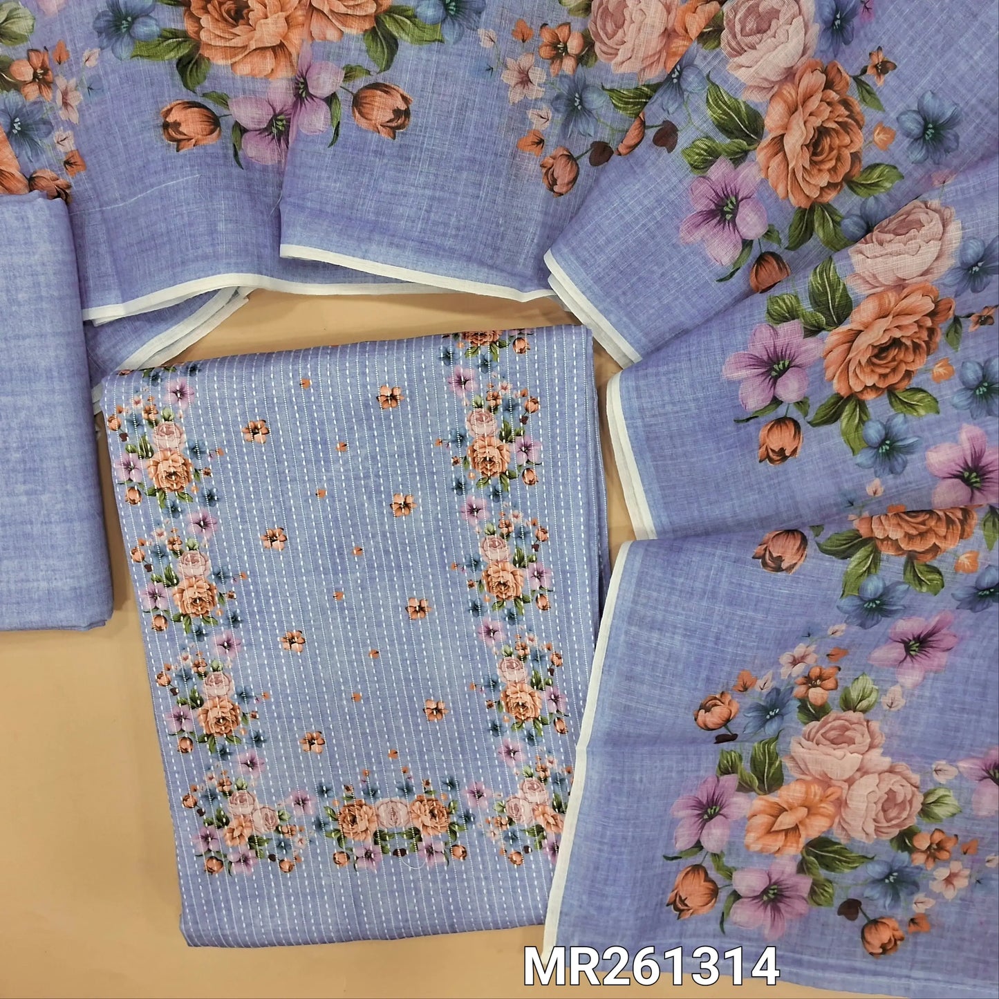 Powder blue soft spun cotton unstitched salwar material, floral printed yoke, kantha stitch allover (lining optional) spun cotton bottom, floral printed semi linen dupatta. MR261314