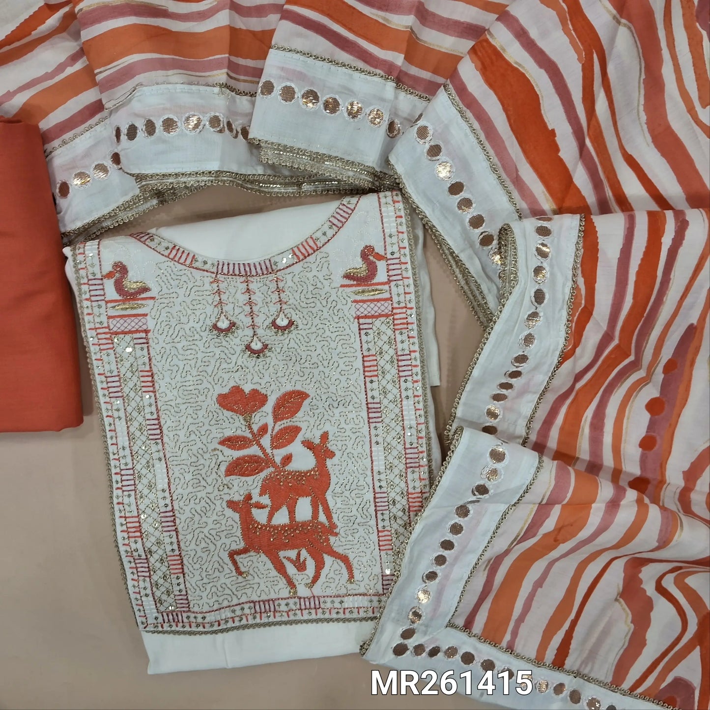 Half white base premium silk cotton unstitched salwar material, zari and thread embroidery on yoke, (lining needed)dark peachish pink spun cotton bottom,abstract printed soft silk cotton dupatta with foil work borders with lace tapping. MR261415