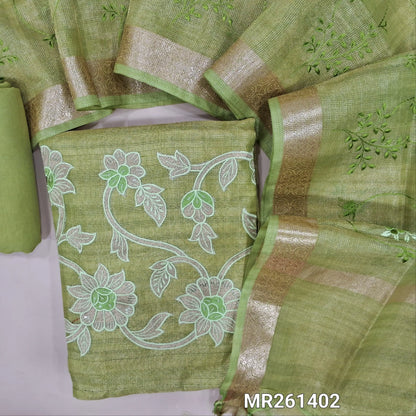 Pastel green with golden tint tissue kota unstitched salwar material (lining needed) embroidery work on front, thread embroidery and applique work on daman ,matching santoon bottom, rich embroidery work on tissue kota dupatta with zari borders. MR261402