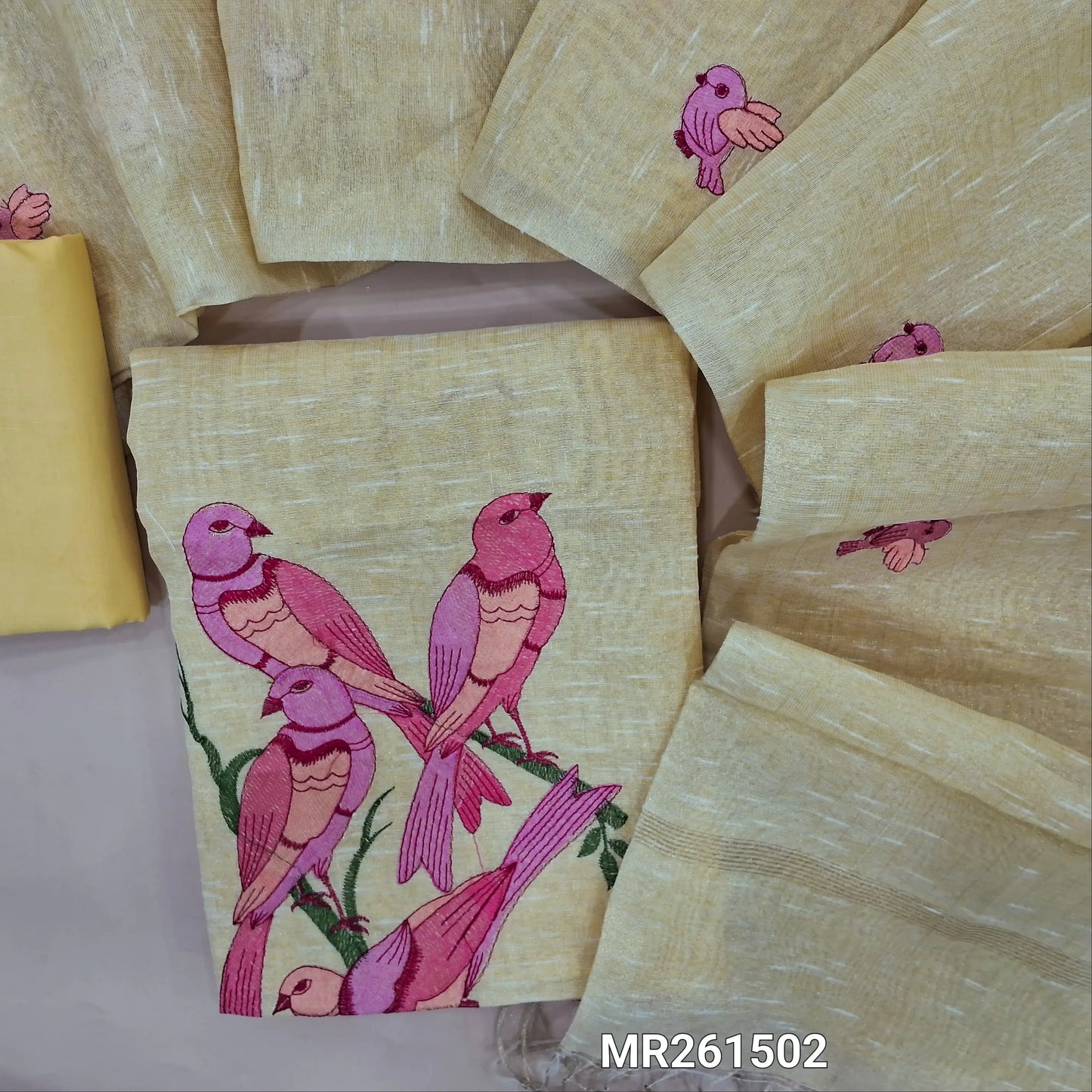 Pastel yellow with golden tint tissue linen unstitched salwar material, zari lines all over,rich thread embroidery on front, (lining needed)cotton bottom,embroidery on full length tissue linen dupatta. MR261502