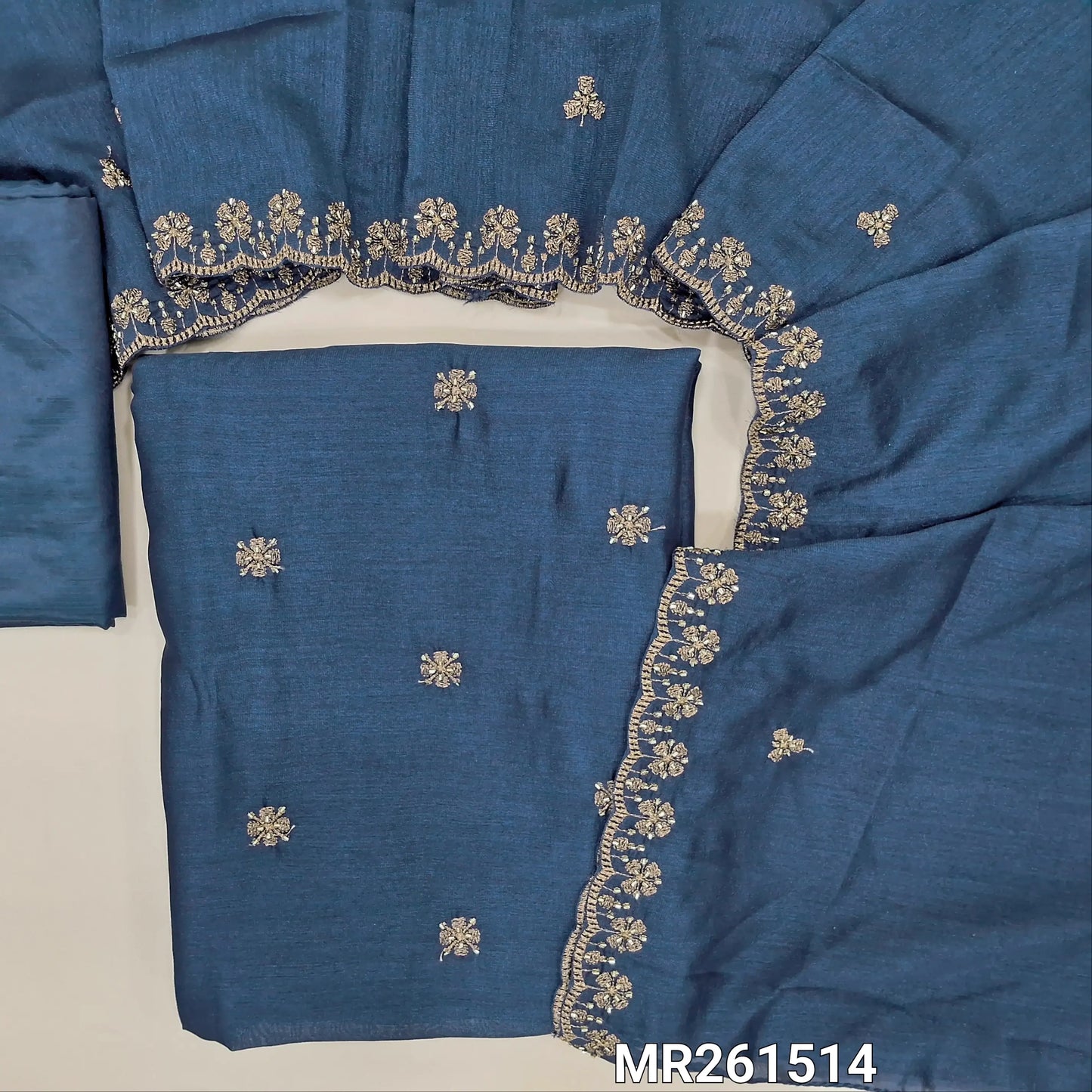 Dark blue fancy silk unstitched salwar material,zari and cut bead work on front, (Shiny, Lining Needed) matching silky bottom, zari and cut bead work on fancy silk dupatta with scallop edges. MR261514