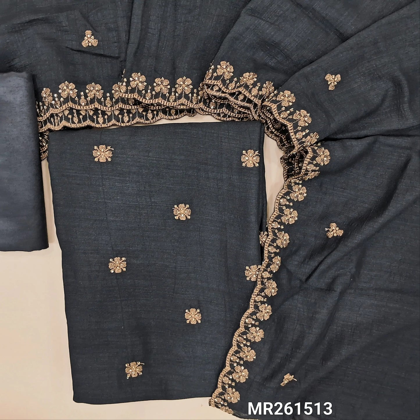 Black fancy silk unstitched salwar material,zari and cut bead work on front, (Shiny, Lining Needed) matching silky bottom, zari and cut bead work on fancy silk dupatta with scallop edges. MR261513