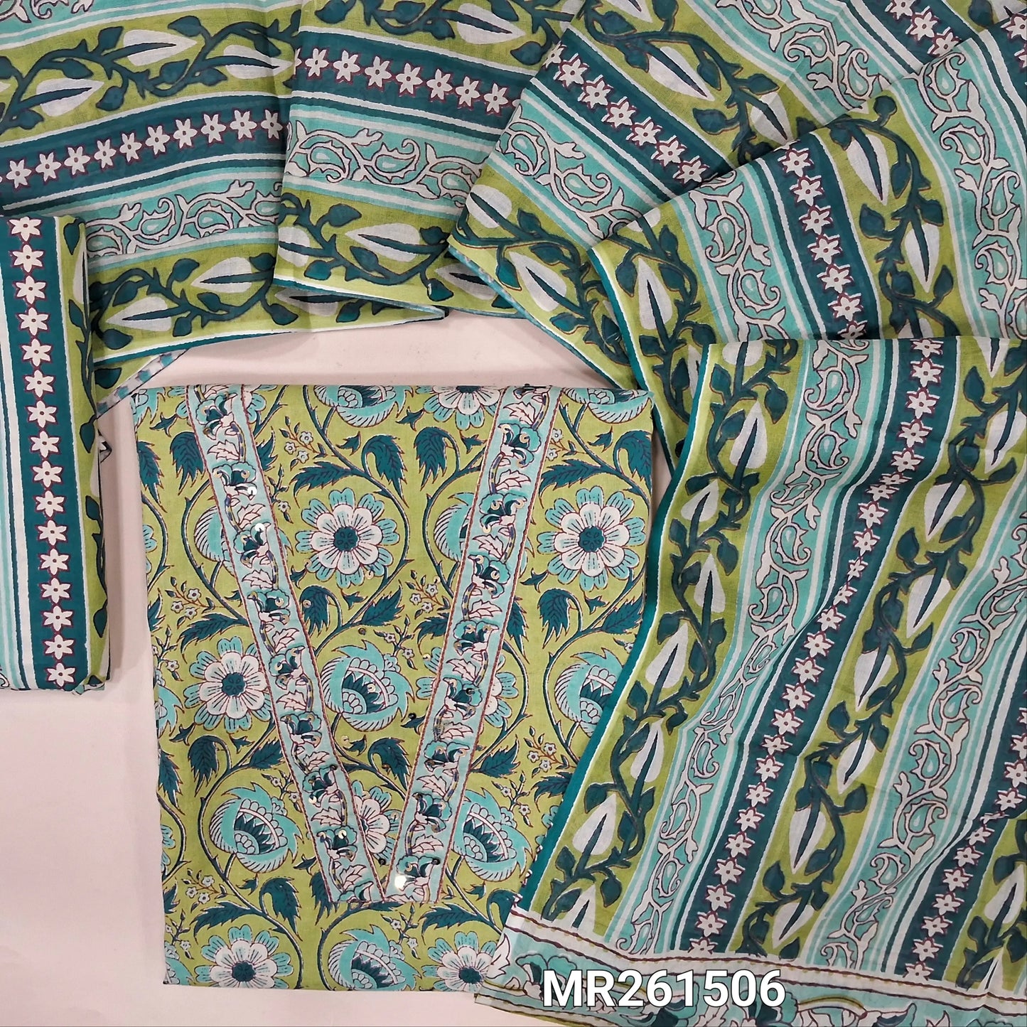 Pastel green floral printed pure cotton unstitched salwar material,v neck with kantha stitch and sequins work on yoke,(lining optional) printed cotton bottom, printed full length cotton dupatta. MR261506