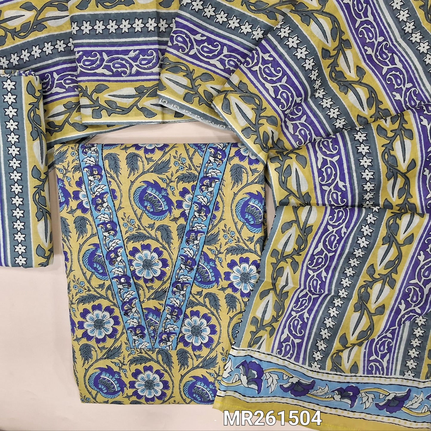 Pastel yellow floral printed pure cotton unstitched salwar material,v neck with kantha stitch and sequins work on yoke,(lining optional) printed cotton bottom, printed full length cotton dupatta. MR261504