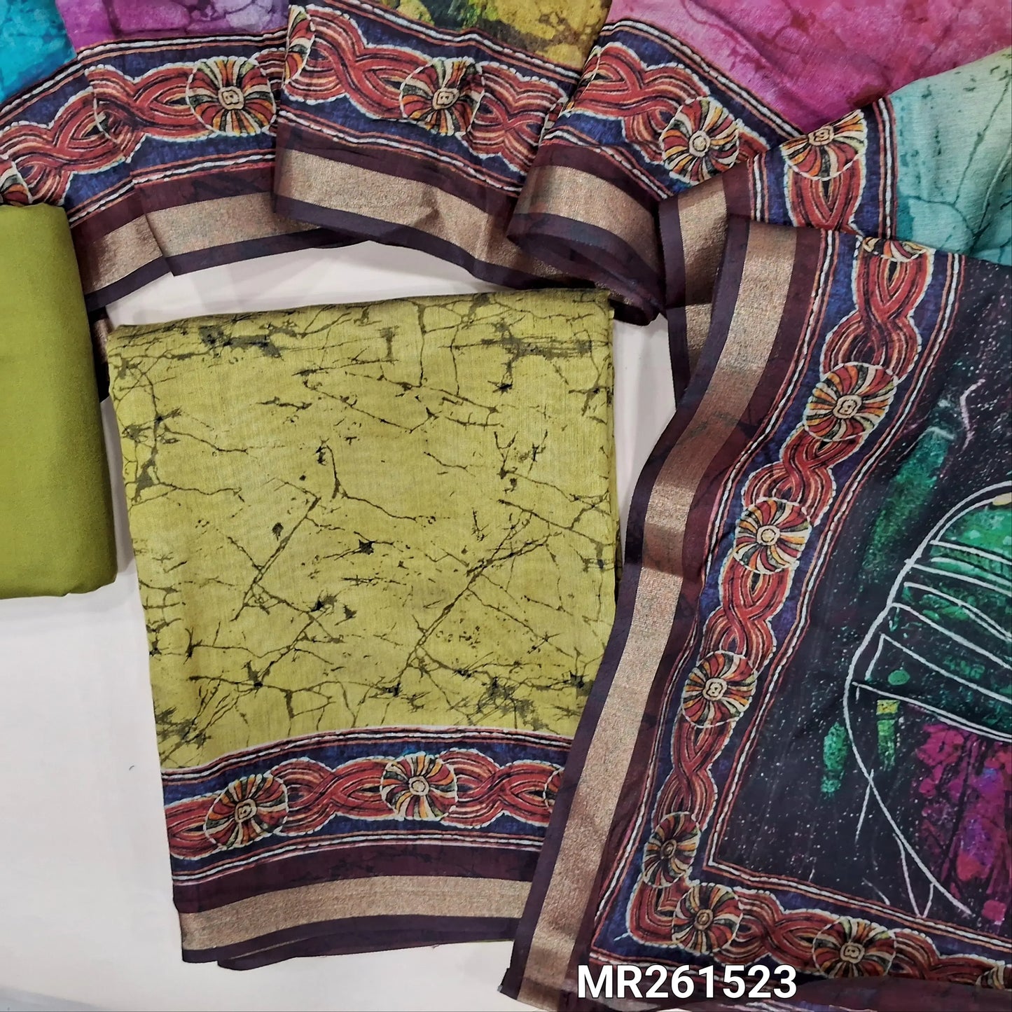 Mehandhi green abstract printed premium silk cotton unstitched salwar material, tissue daman border,(lining needed)spun cotton bottom,digital printed multicoloured silk cotton dupatta with tissue borders. MR261523