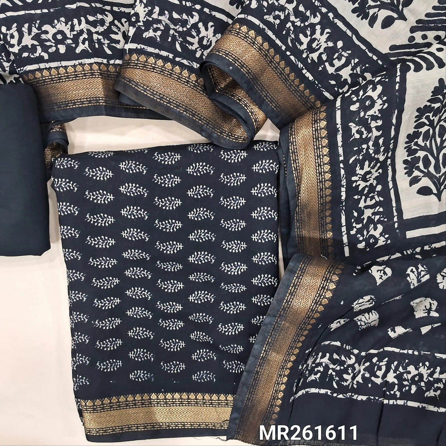 Black Printed soft silk cotton unstitched salwar material (lining needed) nizam borders on daman, matching spun cotton bottom, printed full length silk cotton dupatta with borders. MR261611