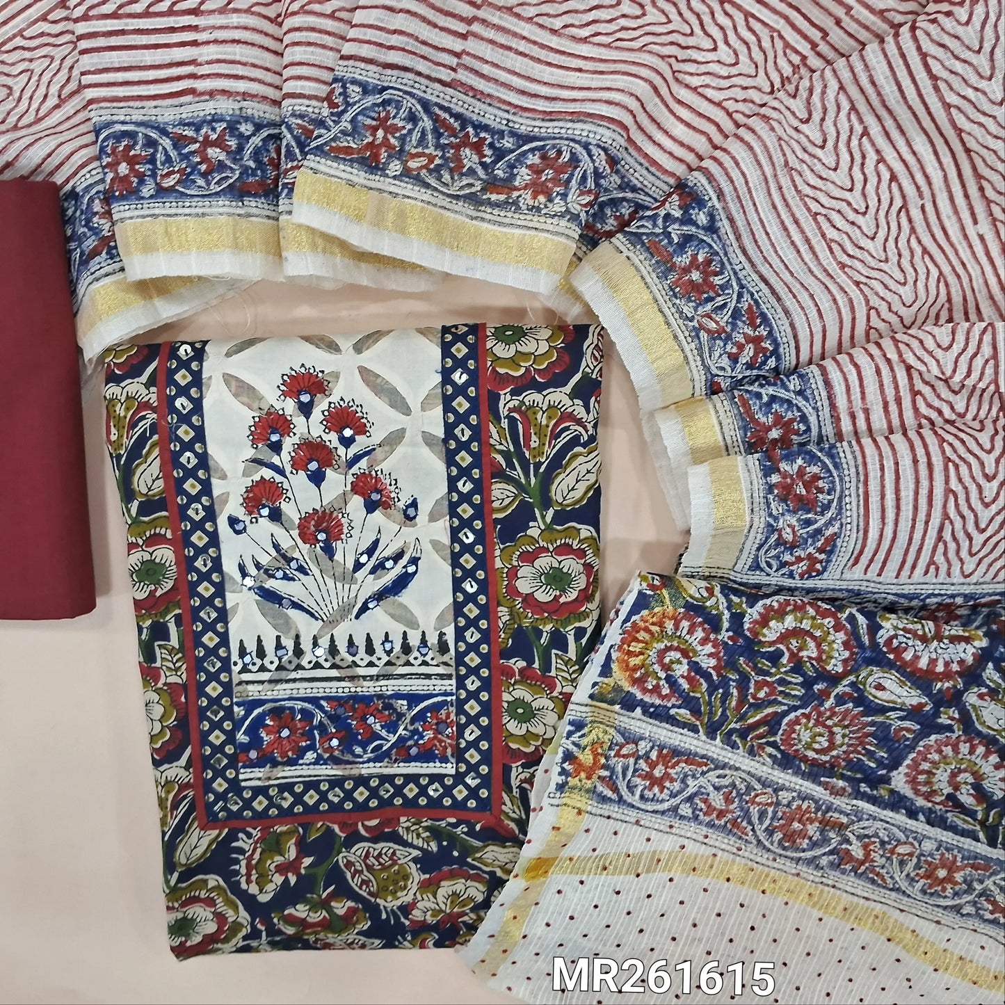 Blue  floral printed pure cotton unstitched salwar material,faux mirror,applique work and hand block prints on yoke(lining optional)maroon cotton bottom, hand block printed kota cotton dupatta with zari borders. MR261615
