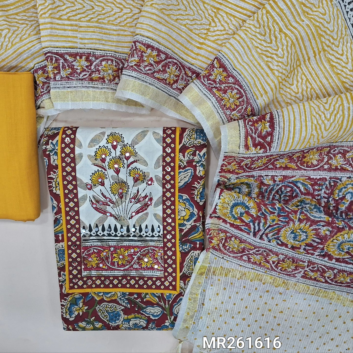 Reddish maroon floral printed pure cotton unstitched salwar material,faux mirror,applique work and hand block prints on yoke(lining optional)mehandhi yellow cotton bottom, hand block printed kota cotton dupatta with zari borders. MR261616