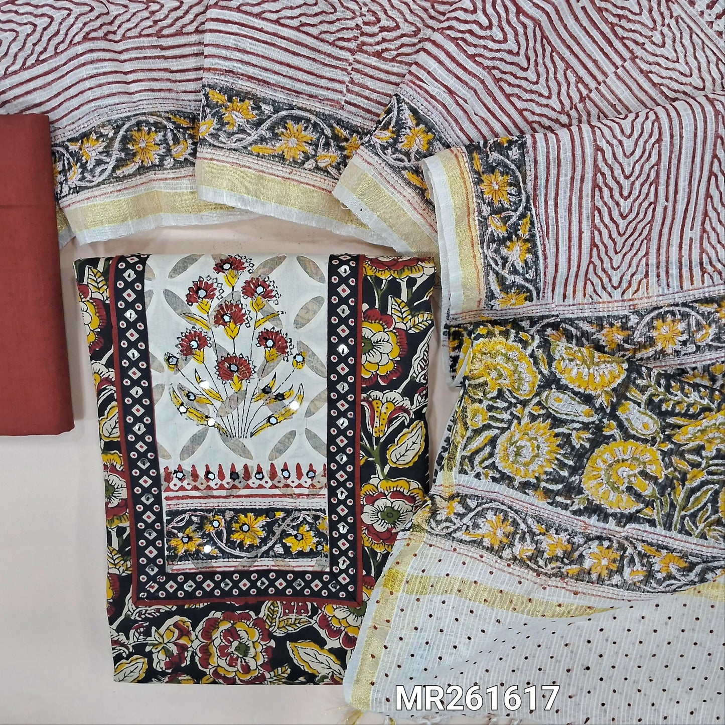 Black floral printed pure cotton unstitched salwar material,faux mirror,applique work and hand block prints on yoke(lining optional)maroon  cotton bottom, hand block printed kota cotton dupatta with zari borders. MR261617