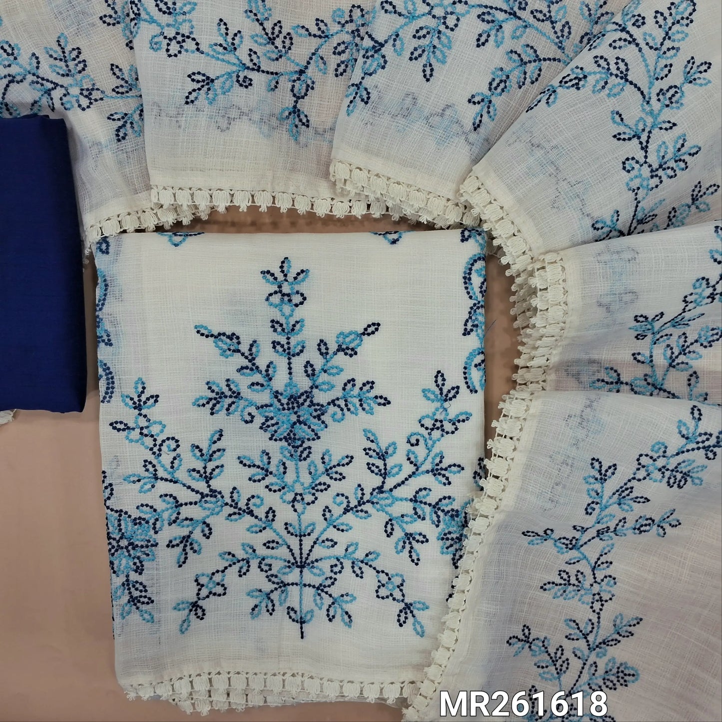 Off white base fancy kota silk cotton unstitched salwar material, embroidery work on front(thin, lining needed)Dark blue silk cotton or silky bottom, embroidery work on full length kota silk cotton dupatta with lace tapping. MR261618