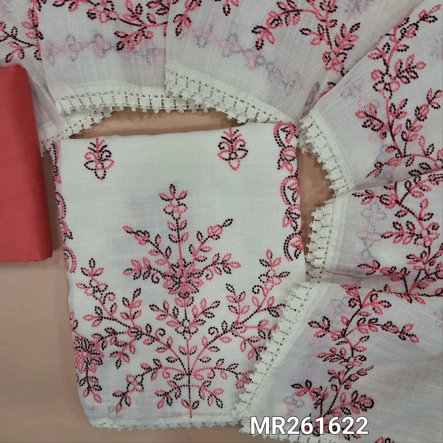 Off white base fancy kota silk cotton unstitched salwar material, embroidery work on front(thin, lining needed)peachish pink silk cotton or silky bottom, embroidery work on full length kota silk cotton dupatta with lace tapping. MR261622