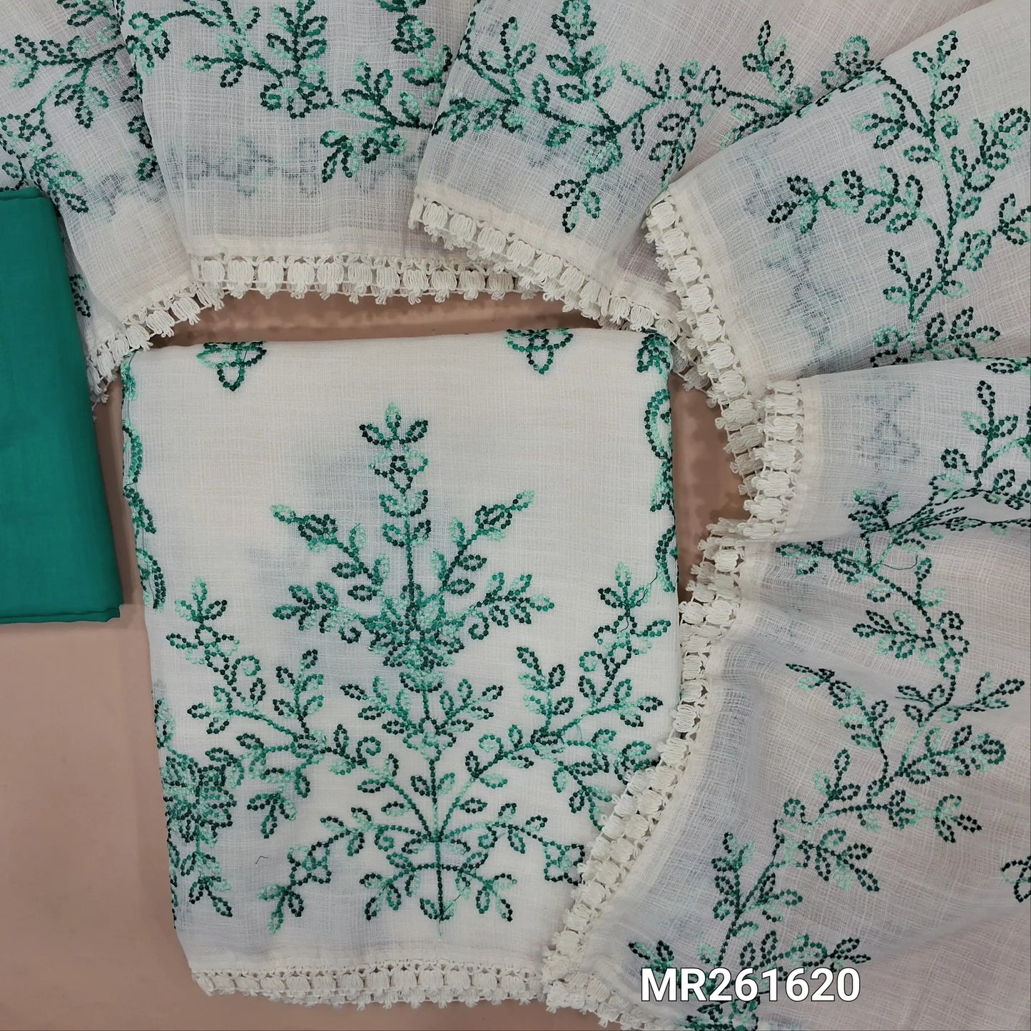 Off white base fancy kota silk cotton unstitched salwar material, embroidery work on front(thin, lining needed)turquoise blue silk cotton or silky bottom, embroidery work on full length kota silk cotton dupatta with lace tapping. MR261620
