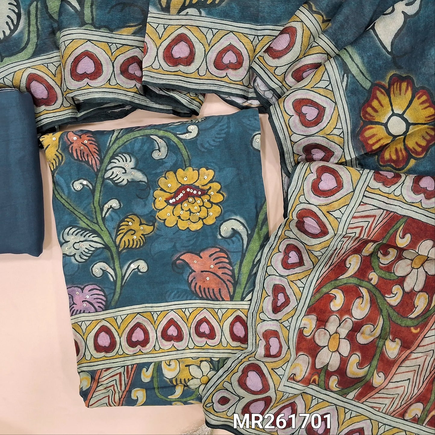 Dark denim blue pure muslin silk unstitched salwar material,v neck, kalamkari printed with sequins work on front, printed daman(lining needed) santoon bottom,kalamkari printed short width pure chinon silk dupatta. MR261701