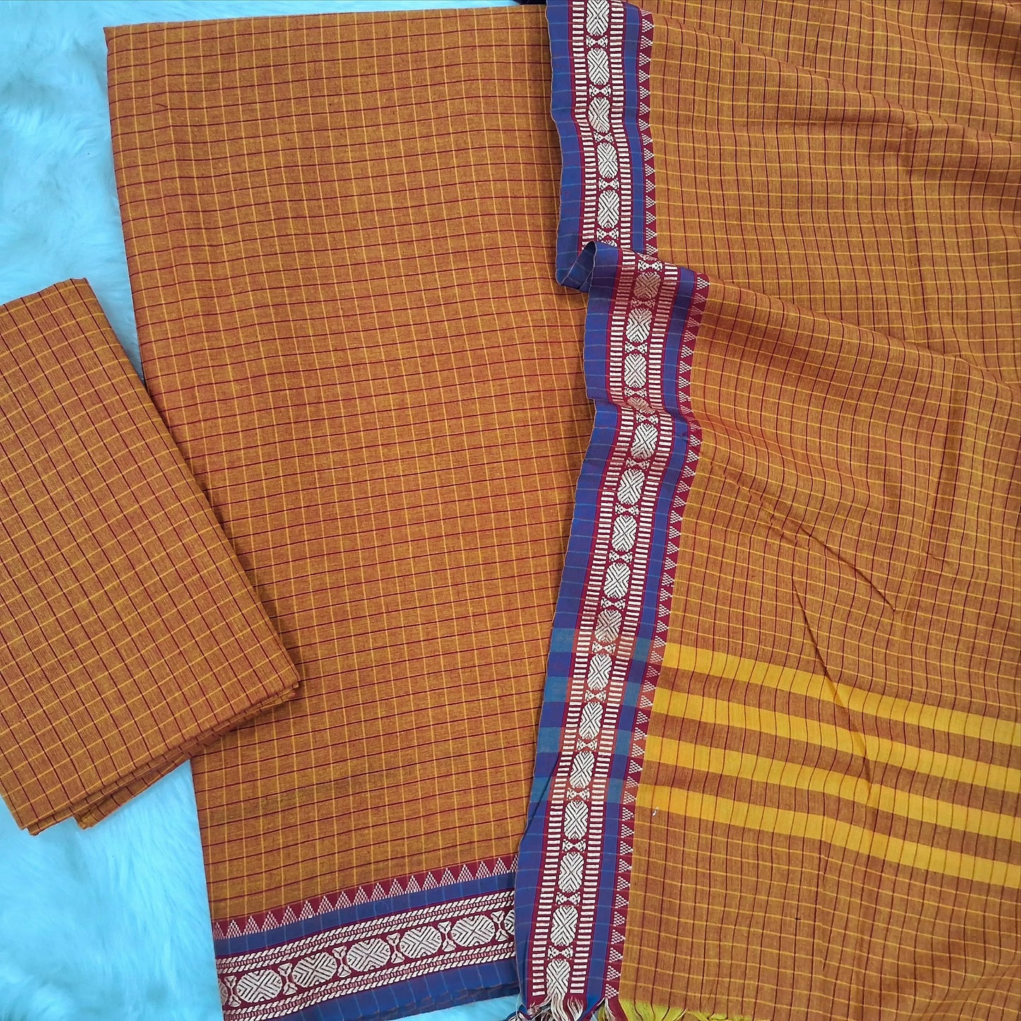 Yellowish orange mercerised handloom cotton unstitched salwar material, checked all over, double side borders (textured,Lining Needed) checked  handloom bottom, checked full length mercerized handloom cotton dupatta. MR262128