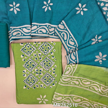 Light green chanderi silk cotton unstitched salwar material,wax batik yoke with embroidery work, wax batik design all over(lining needed)dark teal blue silk cotton bottom,wax batik design on dual shaded chanderi silk cotton dupatta. MR262510