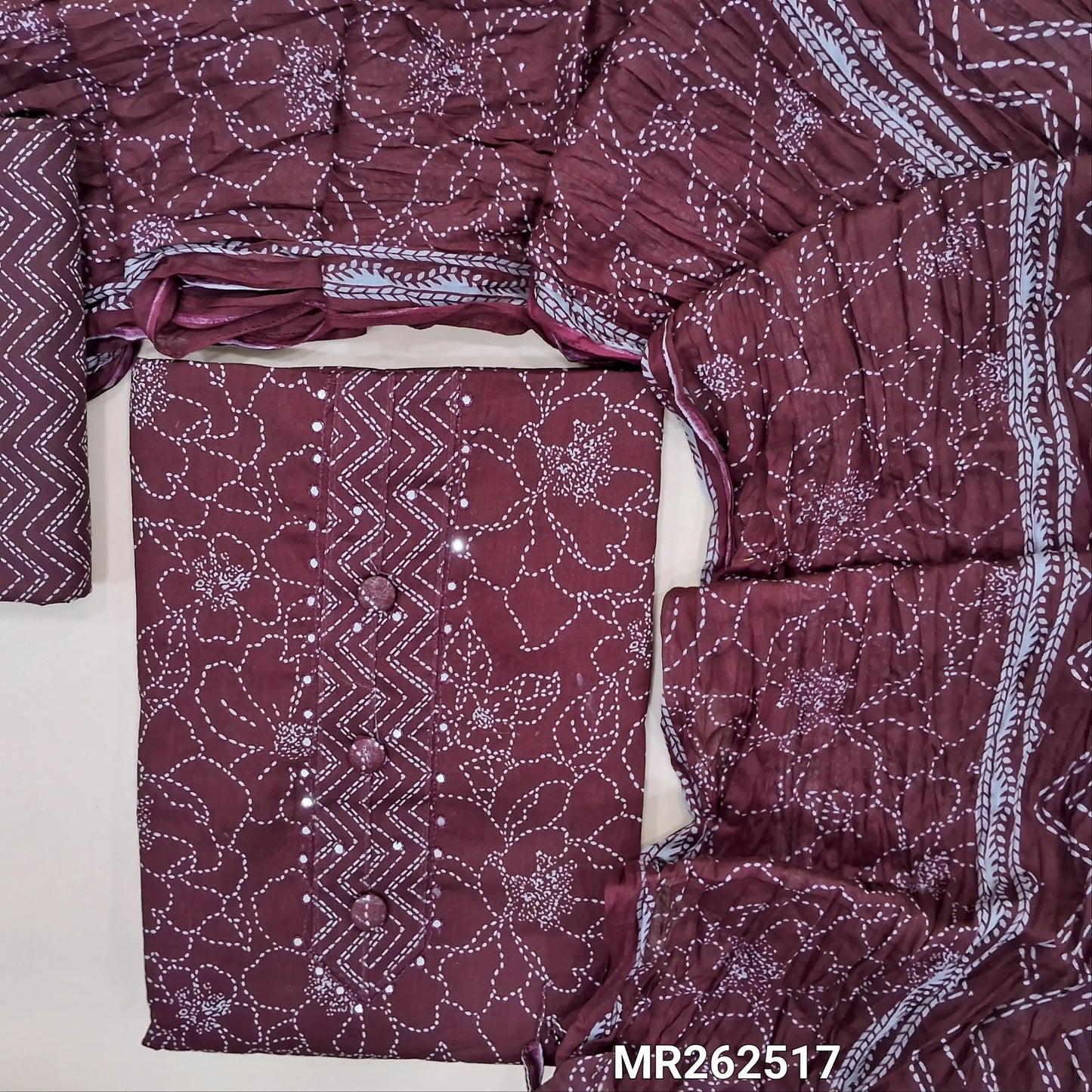 Maroon printed mul cotton unstitched salwar material,faux mirror and buttons on yoke,(lining optional) zigzag printed cotton bottom, printed on crinkled soft mul cotton dupatta. MR262517