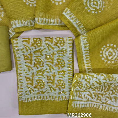 Bright mehandhi green kota unstitched salwar material,wax batik yoke with thread and faux mirror,wax batik printed allover,(thin, lining needed)matching silky fabric provided for both bottom and lining, batik design on kota silk cotton dupatta. MR262906