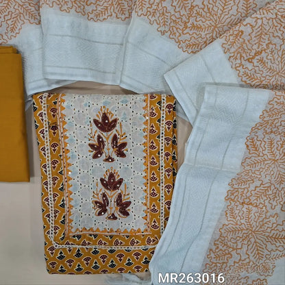 Dark fenugreek yellow printed pure cotton unstitched salwar material, block printed yoke with schiffli work(lining optional)matching cotton bottom, hand block printed and applique work on fancy silk cotton dupatta(TAPING NEEDED). MR263016