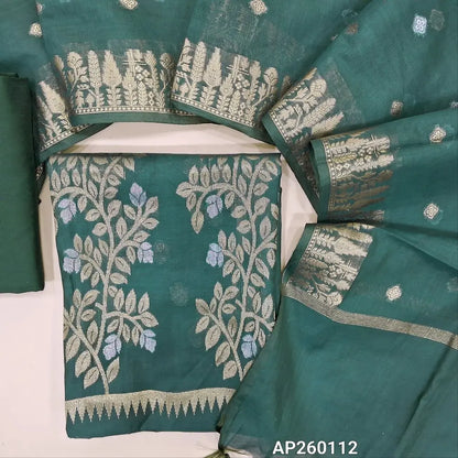 Dark teal green silk cotton unstitched salwar material, gold and silver zari weaving all over, rich weaving daman(lining needed)silk cotton bottom,silver and gold zari buttas on soft silk cotton dupatta with gold zari woven borders. AP260112