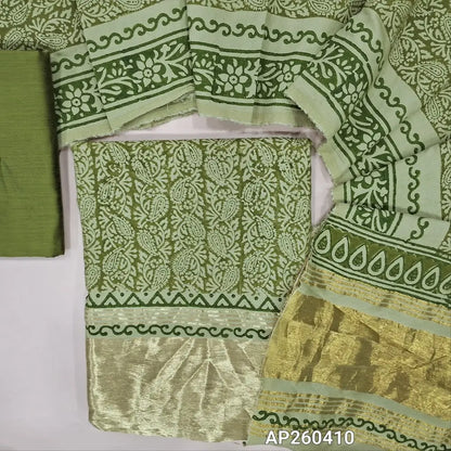 light green block printed fancy silk cotton unstitched salwar material(lining needed) gold tissue borders on daman, dark blue silk cotton bottom, hand block printed fancy silk cotton dupatta with gold tissue pallu. AP260410