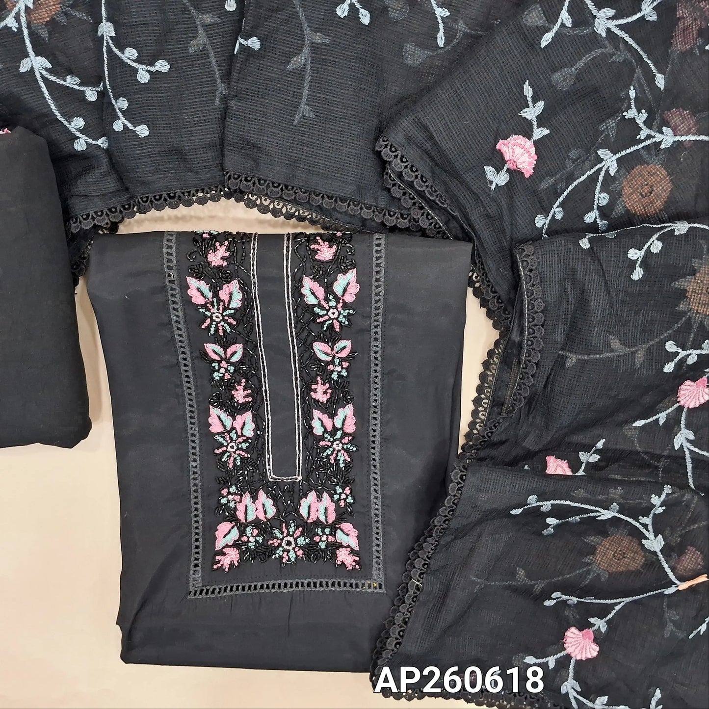 Black premium silk cotton unstitched salwar material, cut bead, lace work and thread embroidery on yoke (lining needed)spun cotton bottom, rich embroidery work on full length kota dupatta with lace tapping. AP260618