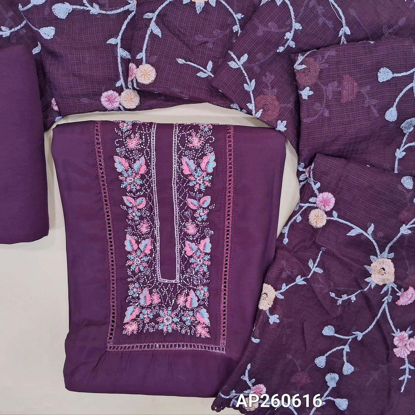 Deep wine purple premium silk cotton unstitched salwar material, cut bead, lace work and thread embroidery on yoke (lining needed)spun cotton bottom, rich embroidery work on full length kota dupatta with lace tapping. AP260616