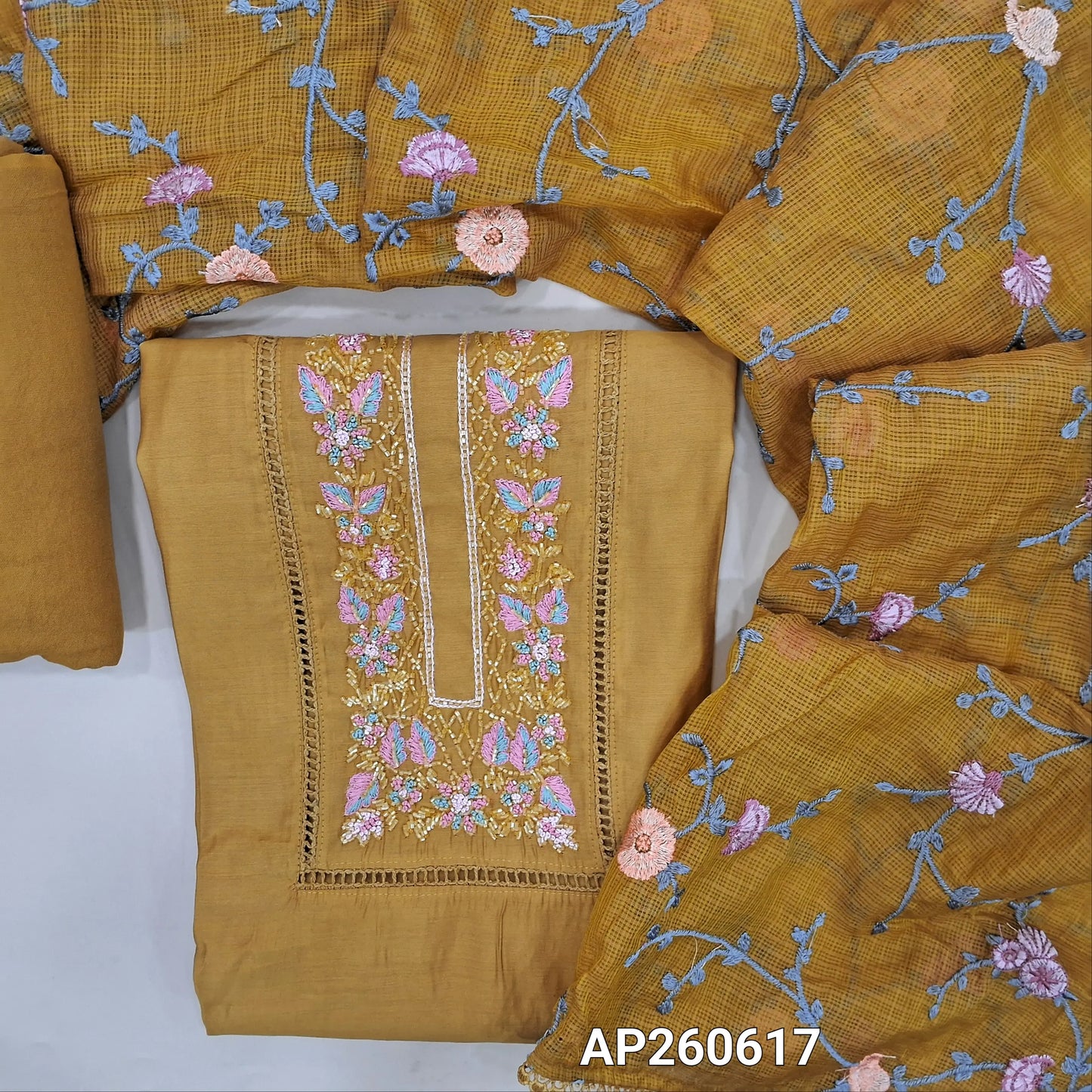 Mehandhi yellow premium silk cotton unstitched salwar material, cut bead, lace work and thread embroidery on yoke (lining needed)spun cotton bottom, rich embroidery work on full length kota dupatta with lace tapping. AP260617
