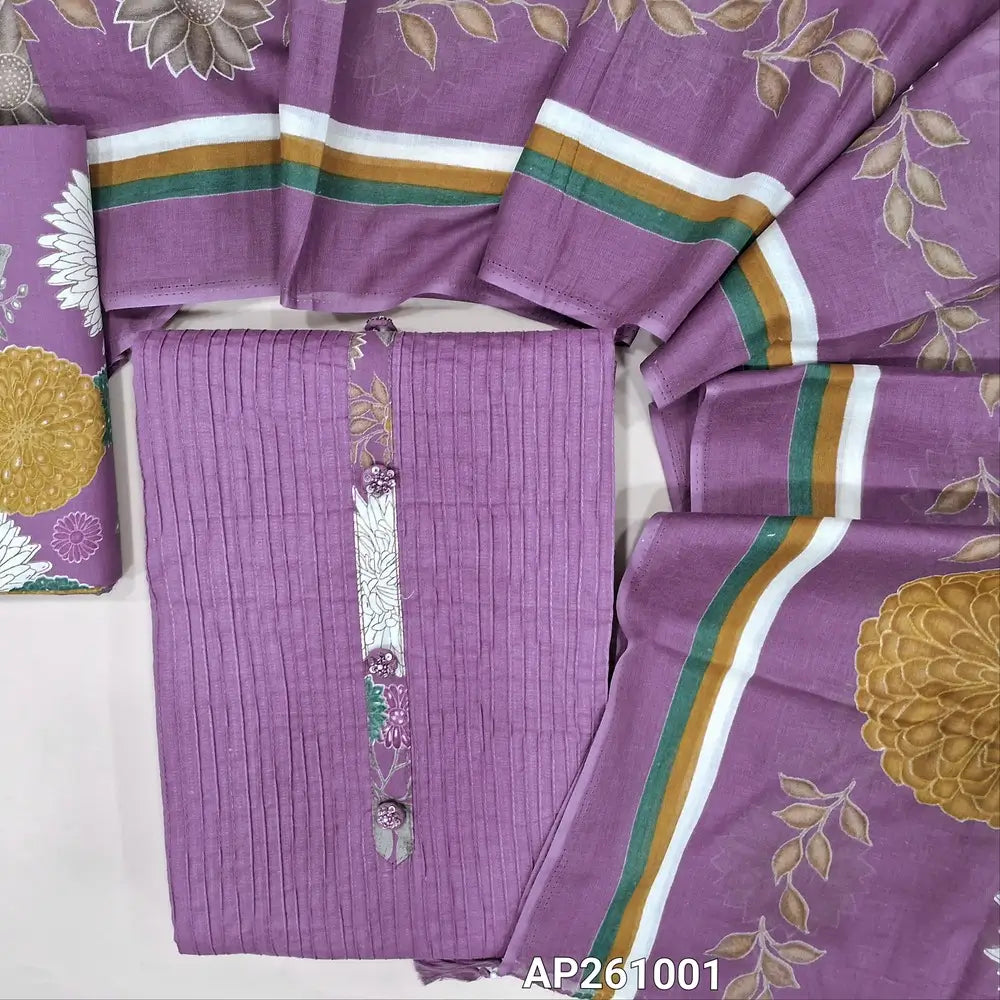 Light purple pure cotton unstitched salwar material,simple yoke with fancy buttons, pintex detailing on front,(lining needed) multicoloured printed cotton bottom,colorful floral printed mul cotton dupatta. AP261001
