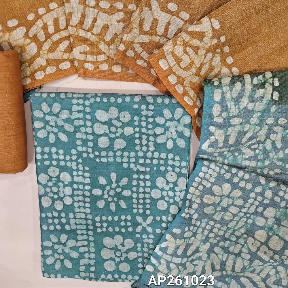 Light teal blue original batik bagalpuri jute silk cotton unstitched salwar material(lining optional) mehandhi yellow batik dyed jute silk bottom, dual shaded original batik dyed jute silk dupatta. AP261023