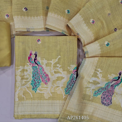 Pastel yellow silk cotton unstitched salwar material, floral buttas on front,thread weaving design on daman, (Silky, Lining Needed)silky bottom, thread weaving on soft silk cotton dupatta with thread woven borders. AP261405